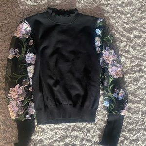 Black top with sheer floral sleeves